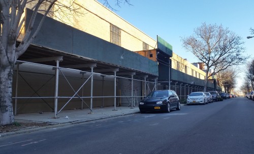 Scaffolding on Dupont Street in Greenpoint lacks visible permiting and stretches far beyond Lot 57; A. Simon