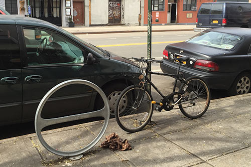 nused hoop rack on Manhattan Avenue - Greenpoint