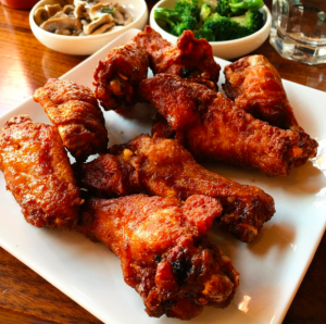Korean fried chicken wings from instagram @Little Dokebi repost from @nycbbq