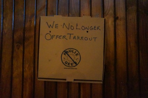 Pizza box signage at Paulie Gee's