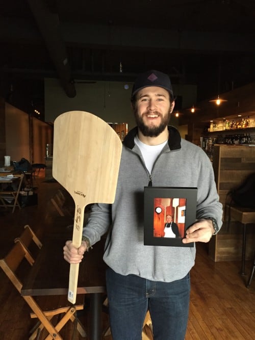TJ Gibs of Paulie Gee's Hampden with "The Tony D" wooden peel