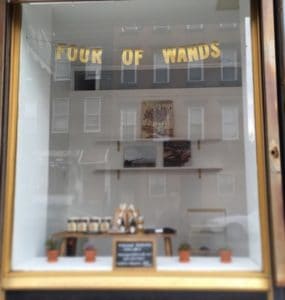 Four of Wands Wellness Collective Williamsburg Store Window