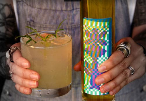 The Floralia gimlet, and Enlightenment Wines colorful Floralia mead bottle at Honey's.