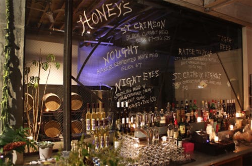 Behind the bar at Honey's. Photo via Honey's.