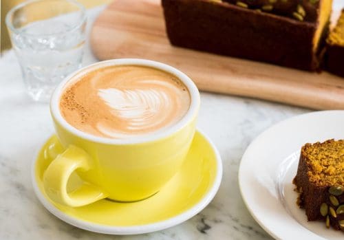 A latte at Ovenly. Photo: Casey Feehan