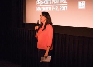 Caryn Coleman introducing the Fest's opening night program