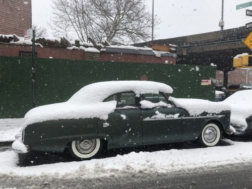 Vintage green car in Greenpoint