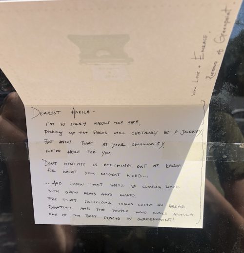 A note posted to the front of Anella. Photo: Megan Penmann
