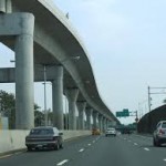 The Air Train in Queens runs over the Van Wyck.