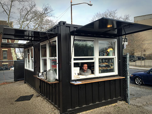 Francois Vauxelaire inside the coffee kiosk at The Lot Radio.