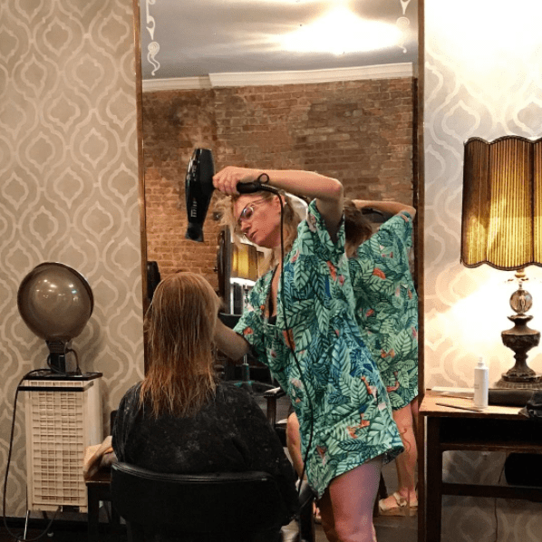 Nackie Karcher works on a client's hair at The Karcher, via Instagram