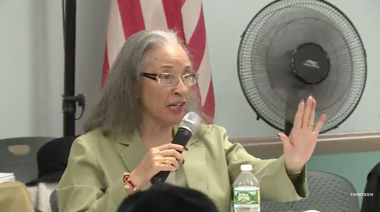 Talk to the hand! Chairperson Dealice Fuller raises her hand at the CB1 Meeting on December 5, 2017