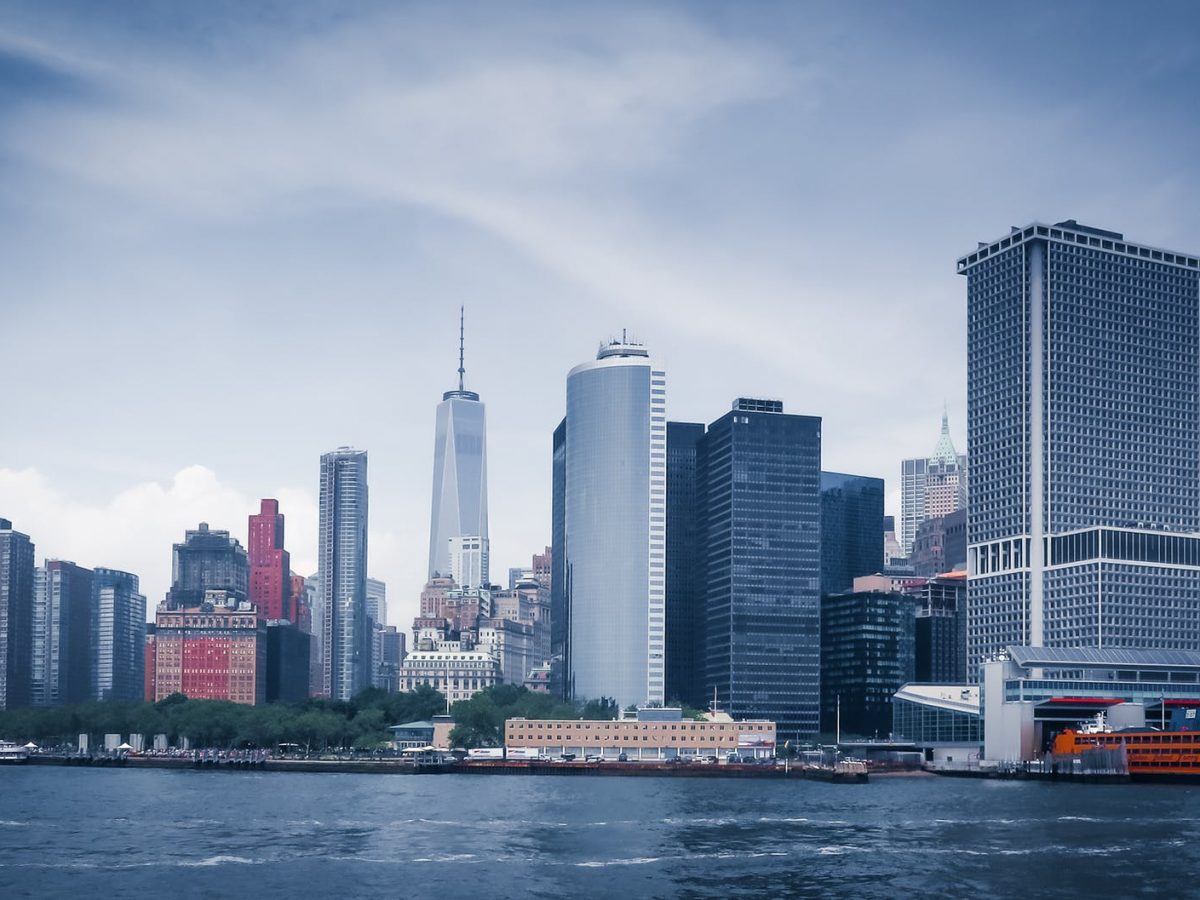 city skyline across body of water