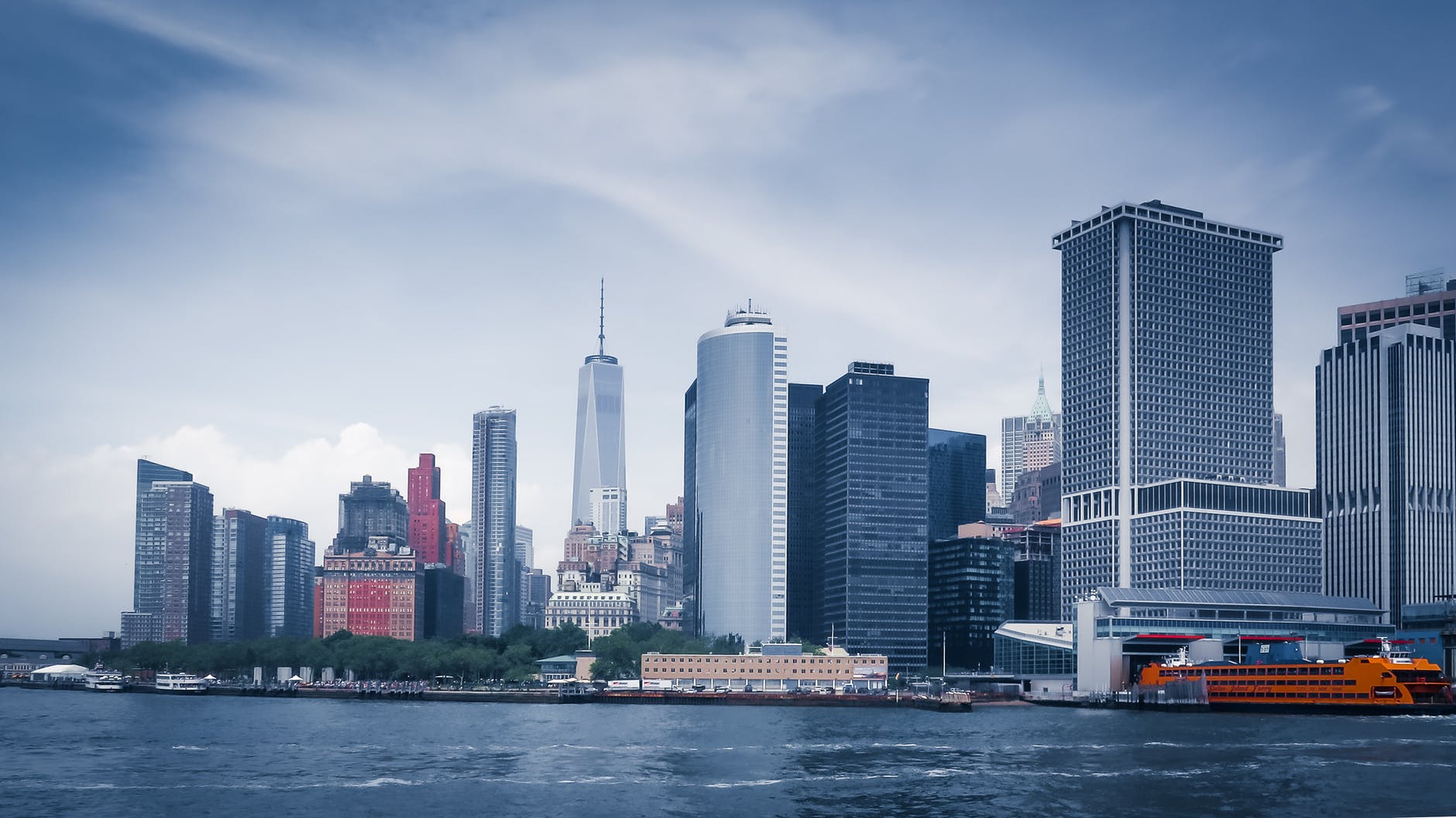 city skyline across body of water